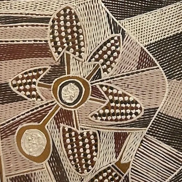 A closer view of the flower form, its petals filled with dotted and hatched patterns